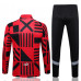 Милан спортивный костюм 2022-2023 красный с чёрными узорами